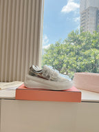 Silberne Plateausneakers