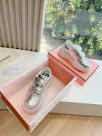 Silberne Plateausneakers